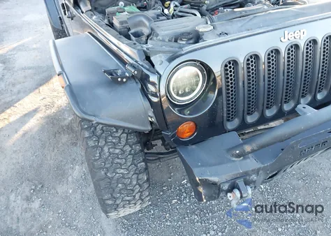 2012 Jeep Wrangler Unlimited Sport z USA, uszkodzony, nr VIN 1C4BJWDG5CL260140